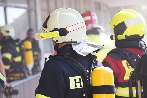 Fire fighters attending a fire alarm activation