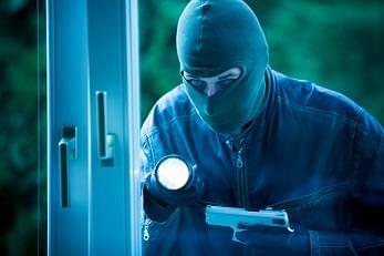 Intruder Breaking into Home